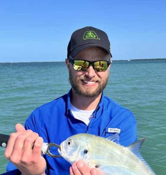 Grant W holding a jack crevalle caught in Key West