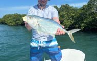Jack Crevalle Catch Key West Angler holding a jack crevalle in Key West backcountry
