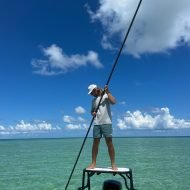 Flats Fishing Guide Key West Guide poling a skiff in the shallow flats of Key West